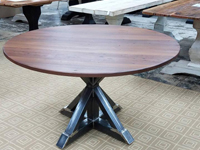 Round reclaimed walnut table